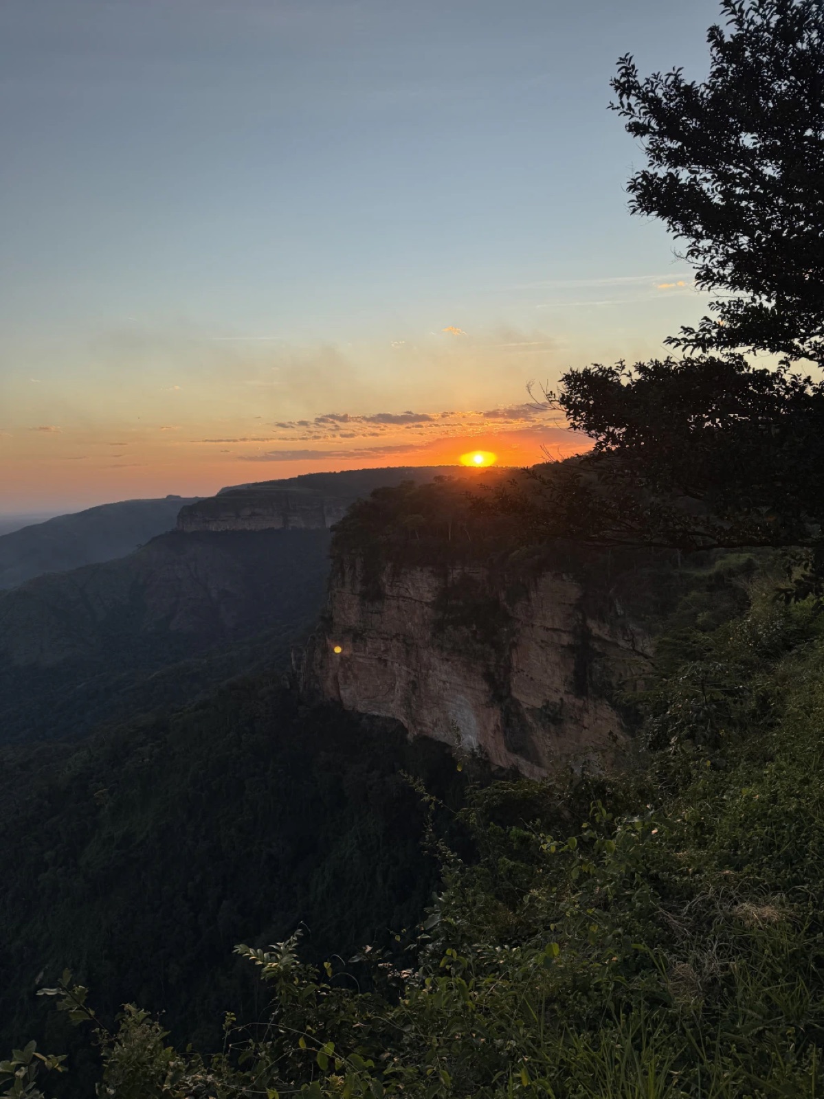 Sunset over the cliffs of Chapada dos Guimarães, seen from a lookout